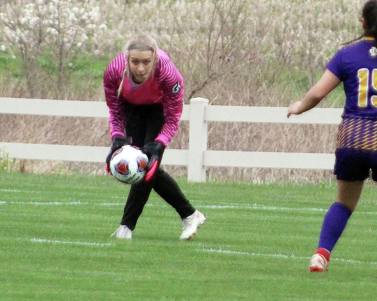 Marquette Catholic High goalie Hannah Marshall notched the shutout in her team's 3-0 victory over Father McGivney High Monday in Glen Carbon.