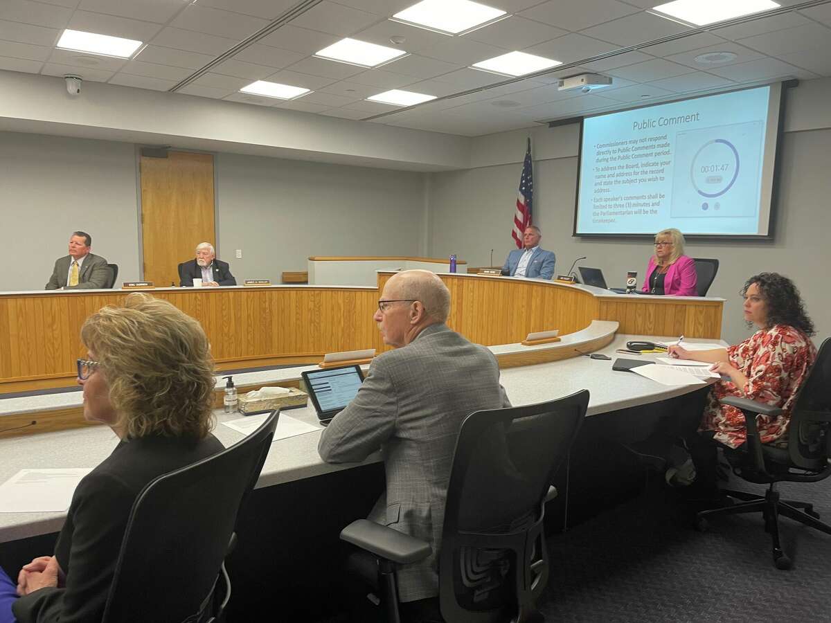 The Midland County Commission listens to a public comment on Tuesday, May 3, 2022 from County resident Terri Lee, who shared her experience of the unintended impacts of the Michigan Auto Insurance Reform Act of 2019. 