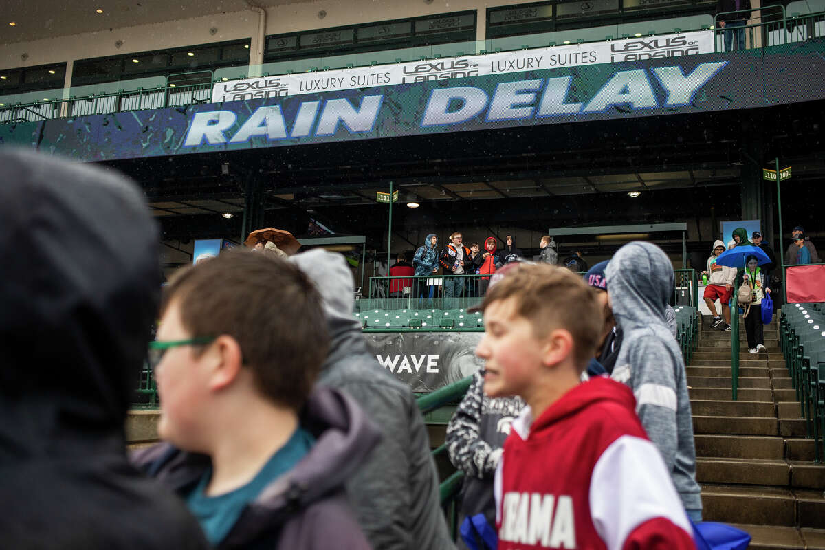 Schoolchildren enjoy concessions for lunch, despite the Great Lakes Loons vs. Beloit Sky Carp game being rained out during School Kids Day on Tuesday, May 3, 2022 at Dow Diamond in Midland.
