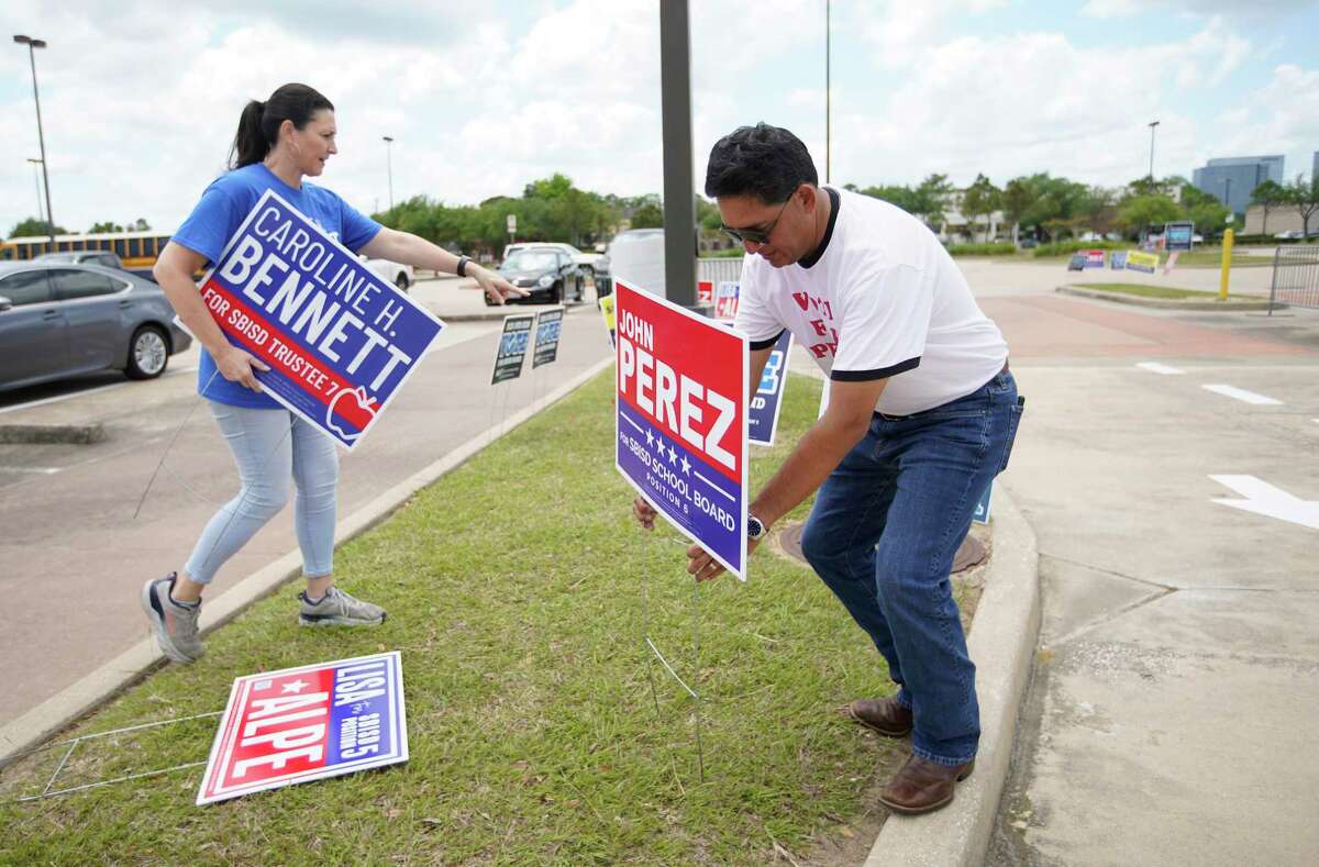 Conservative Spring Branch ISD board candidates John Perez and Caroline H. Bennett campaign today at Don Coleman Coloseum on Friday, April 29, 2022 in Houston.
