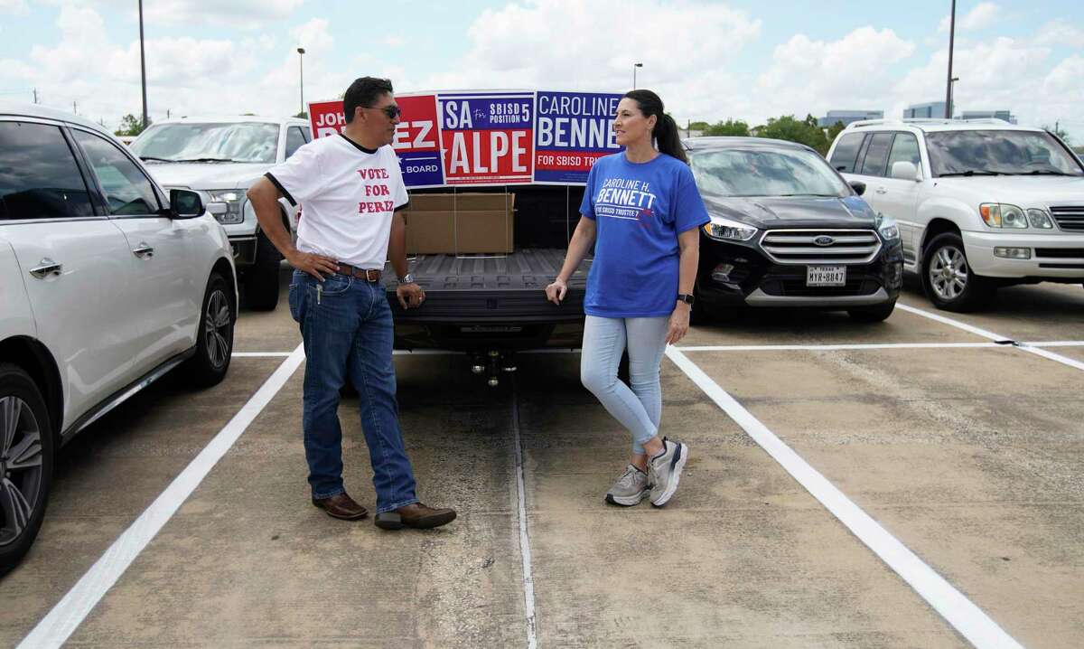 Conservative Spring Branch ISD board candidates John Perez and Caroline H. Bennett campaign today at Don Coleman Coloseum on Friday, April 29, 2022 in Houston.