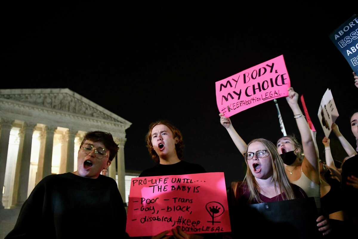 Demonstrators outside the Supreme Court following a public leak of a draft opinion that the Supreme Court has potentially voted to overturn Roe V. Wade, in Washington, May 2, 2022. The decision, which is not expected to be finalized for another month or more and could change in its final form, would leave it to individual states to determine abortion’s legality. (Kenny Holston/The New York Times)