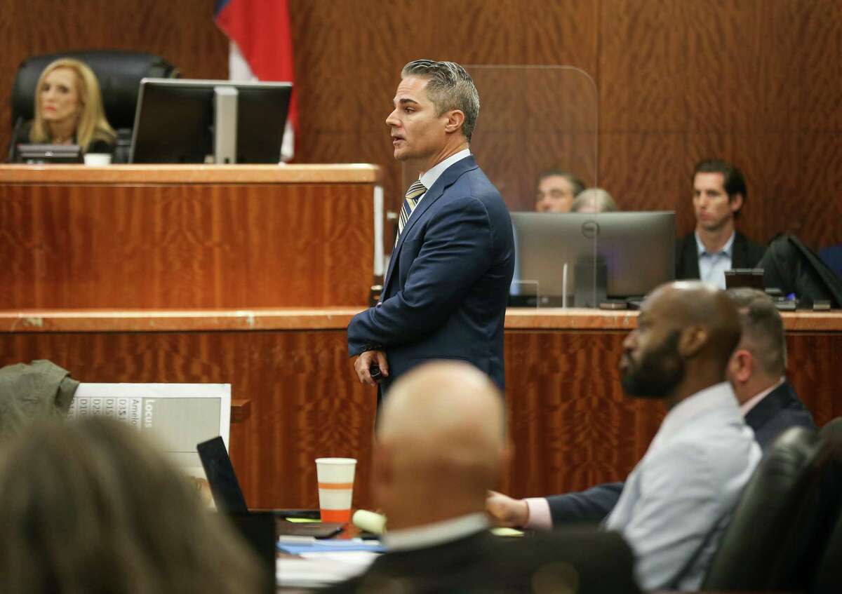 Prosecutor John Jordan, left, delivers his closing arguments during the murder trial of Andre Jackson who is accused for the fatal stabbing of 11-year-old Josue Flores at the Harris County Criminal Courthouse on Tuesday, May 3, 2022, in Houston.