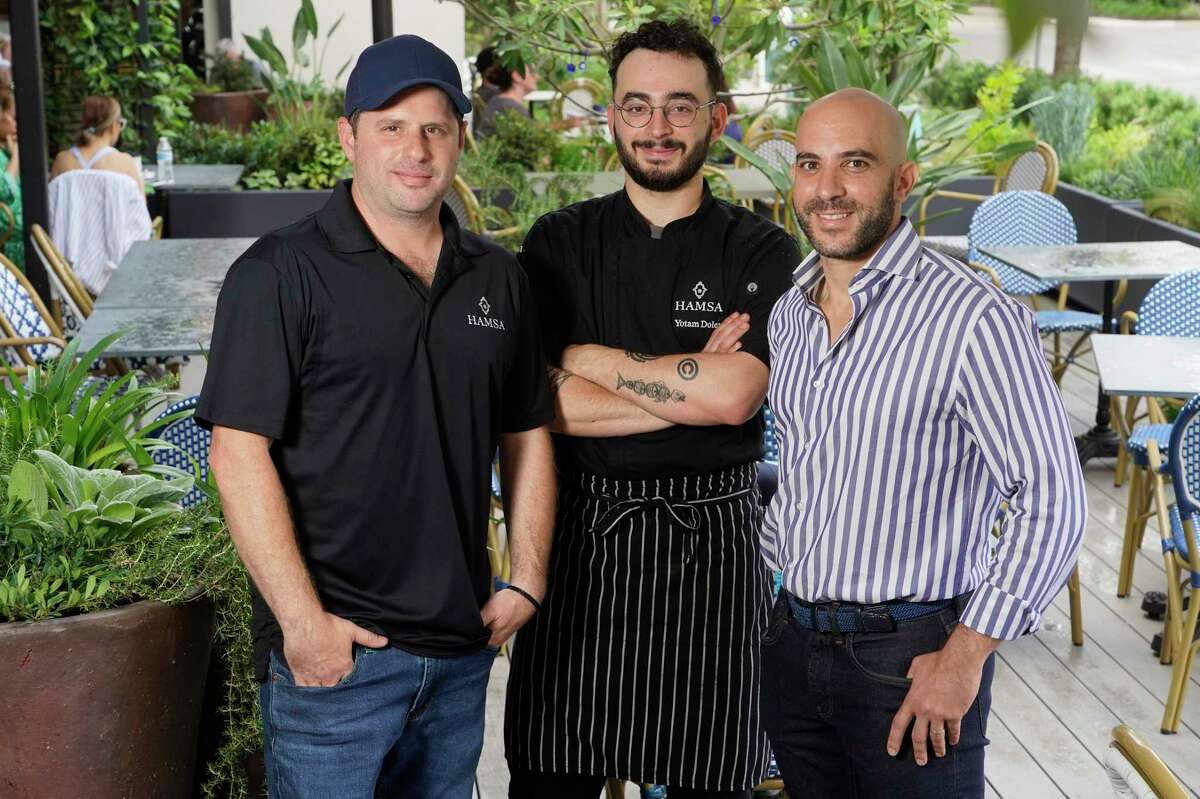 Sash Kurgan, chef/partner, left, Yotam Dolev, chef, and Itai Ben Eli, Sof Hospitality owner/partner at Hamsa, 5555 Morningside Dr., in Rice Village.