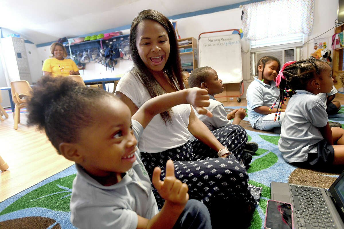 Teacher Meghan Thomas watches as Bryson Wise works his way toward a correct answer in her 3-4-year-old classroom at World of Color Daycare, which has partnered with BISD for early childhood development. Photo made Friday April 29, 2022. Kim Brent/The Enterprise