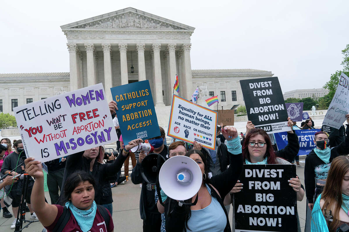 Demonstrators protest outside the Supreme Court in Washington, D.C. A draft opinion suggests the U.S. Supreme Court could be poised to overturn the landmark 1973 Roe v. Wade case that legalized abortion nationwide.