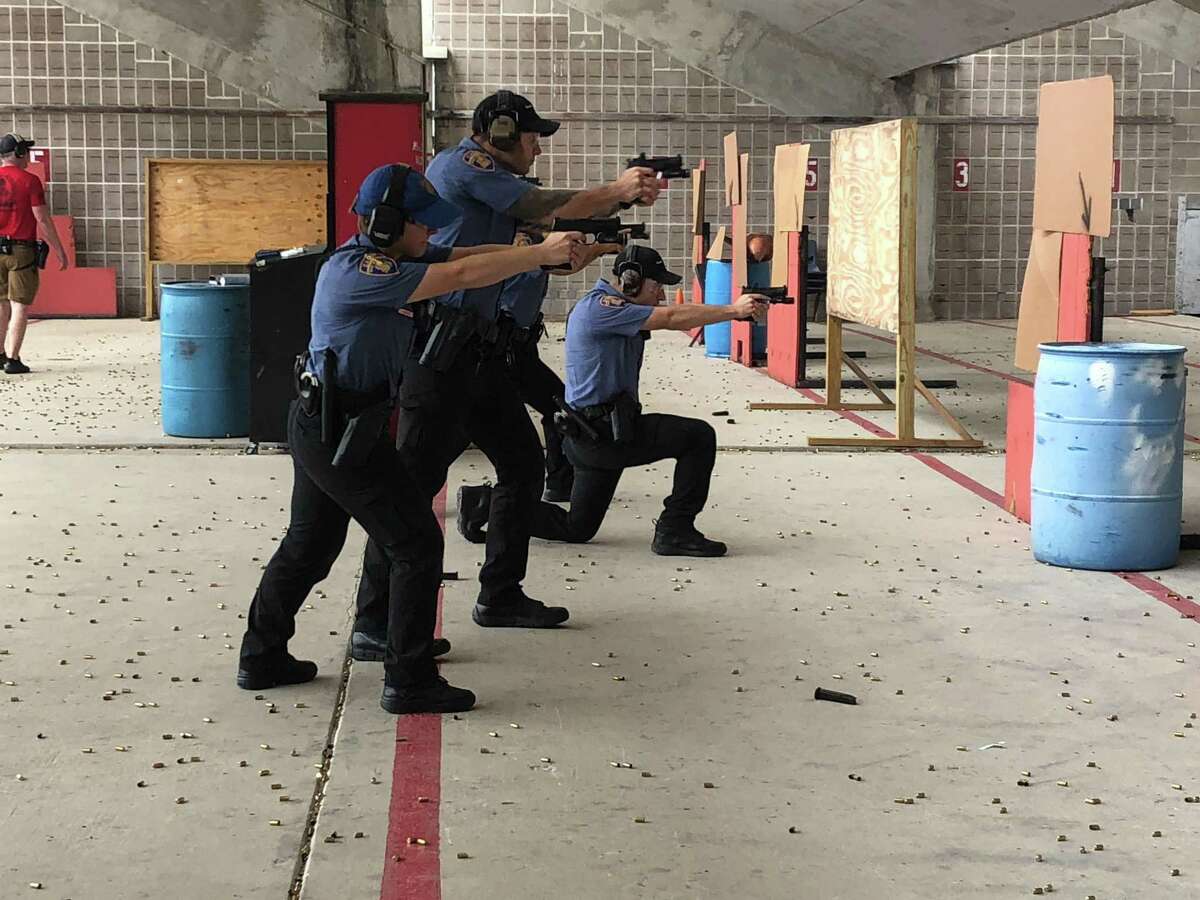 Several officers with San Antonio Police Department showcase their skills at the firing range. The police department is hosting a recruiting event Saturday for women ages 18-44.