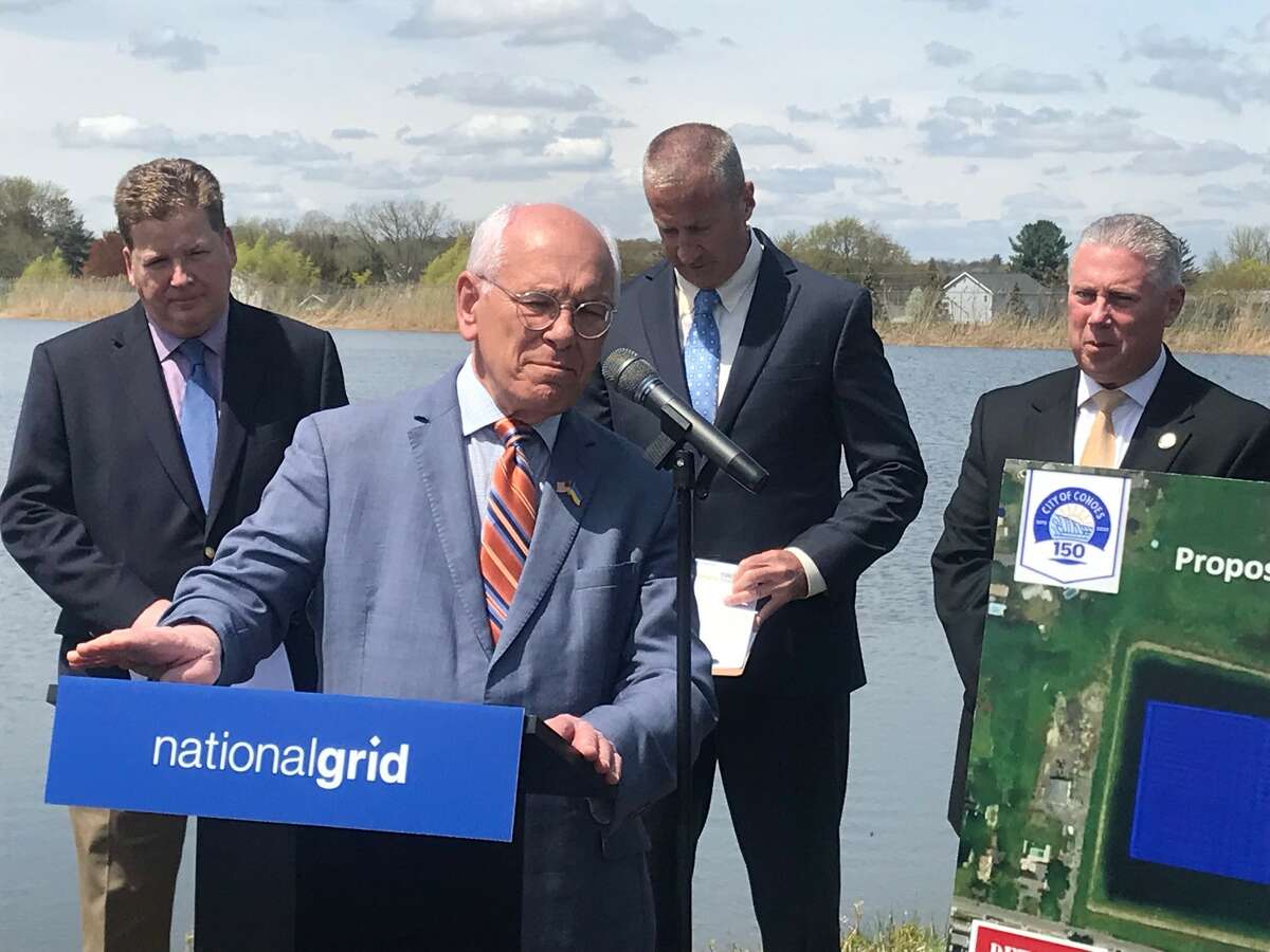 U.S. Rep. Paul Tonko, D-Amsterdam, speaks Tuesday May 3, 2022 at the Cohoes reservoir about the floating solar array to be installed as Mark Egan of the Center for Economic Growth, Mayor Bill Keeler and Assemblyman John T. McDonald III, D-Cohoes, listen,