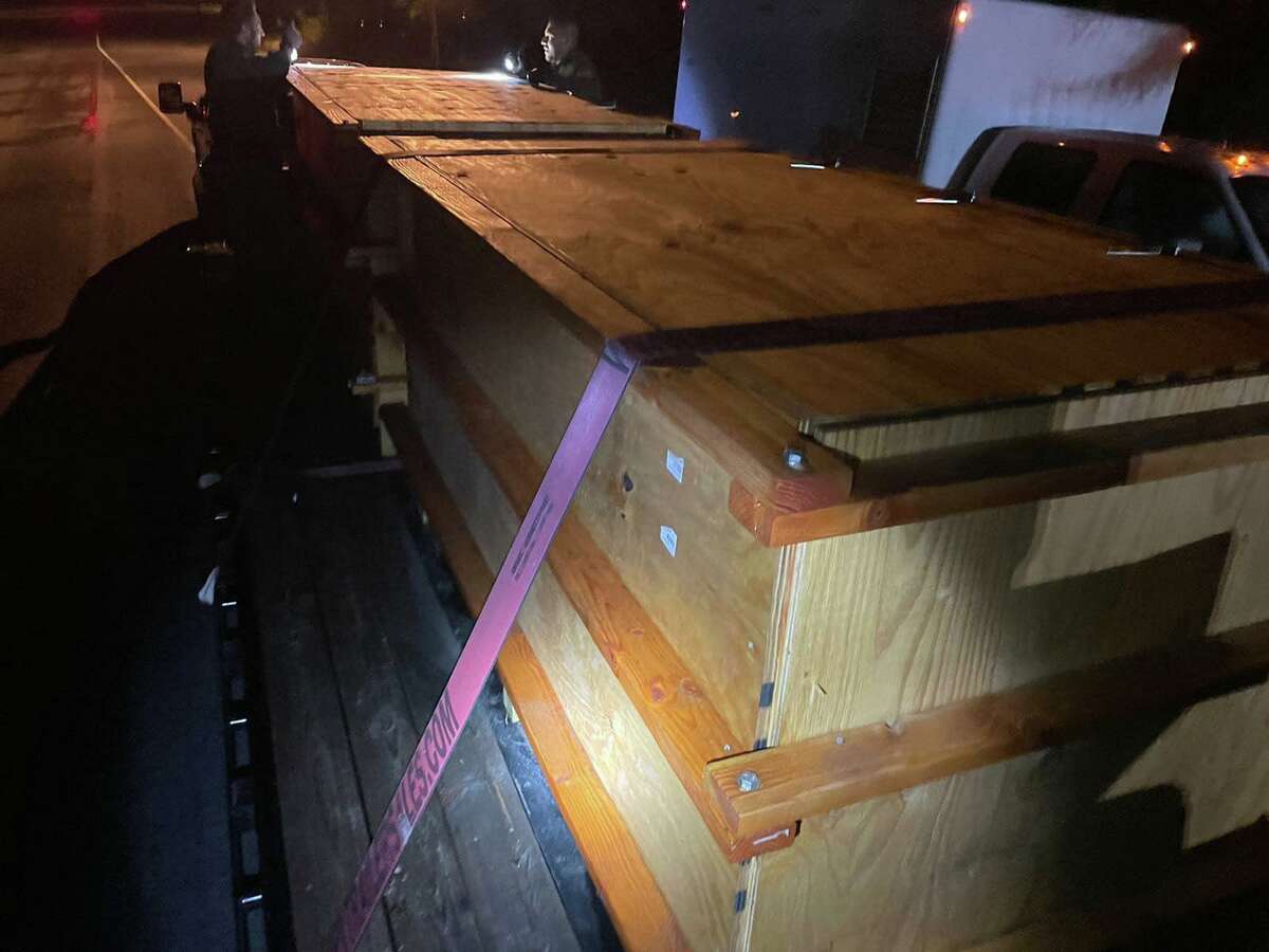 A total of 23 persons were discovered hiding inside crates on top of a flatbed trailer at the Hebbronville checkpoint.