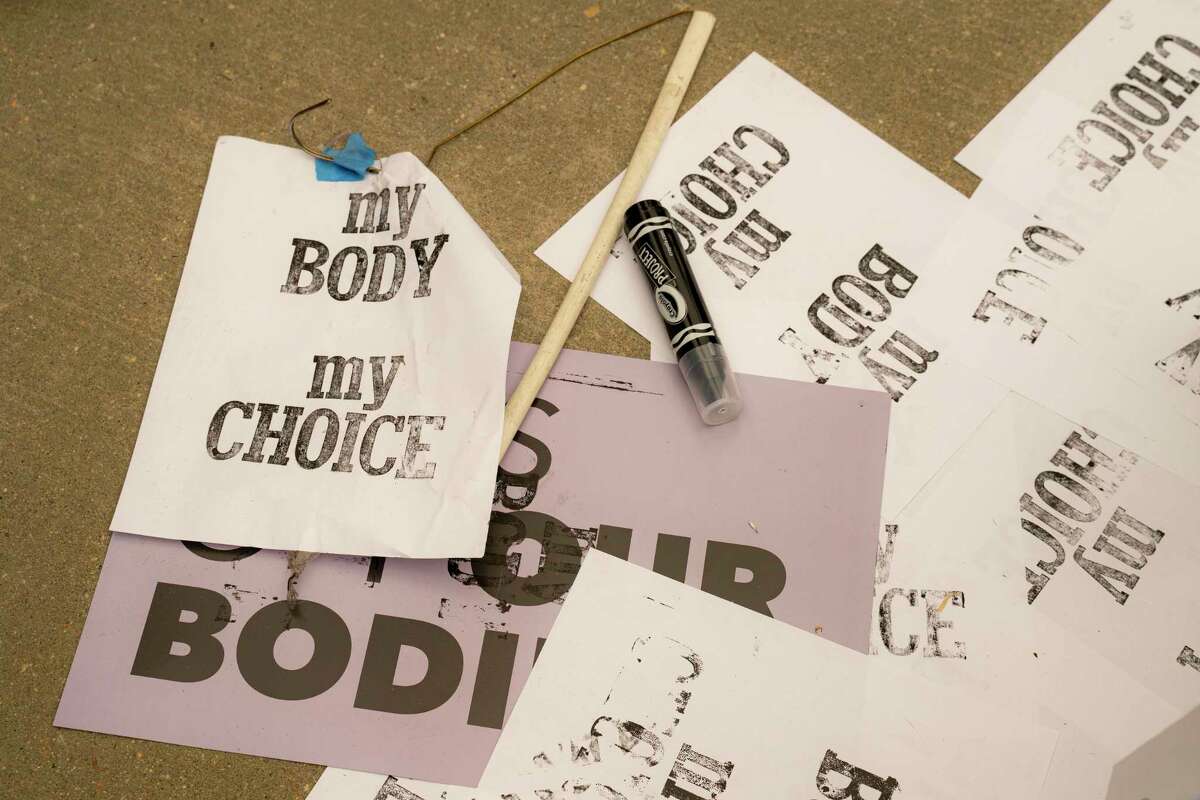 Signs that read “My body, my choice” lay on the ground outside the U.S. Supreme Court in Washington, D.C. on Tuesday, May 3, 2022.