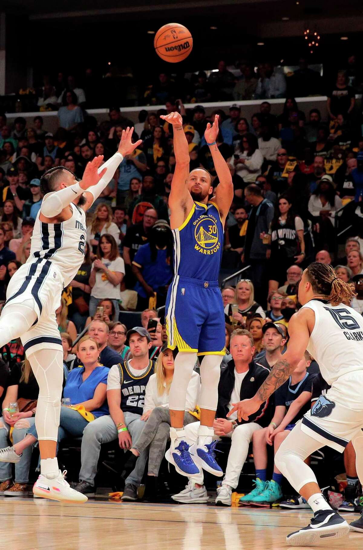 Stephen Curry (30) puts up a three point shot In the first half as the Golden State Warriors played the Memphis Grizzlies in Game 1 of the second round of the NBA Playoffs at Fedex Forum in Memphis, Tenn., on Sunday, May 1, 2022.