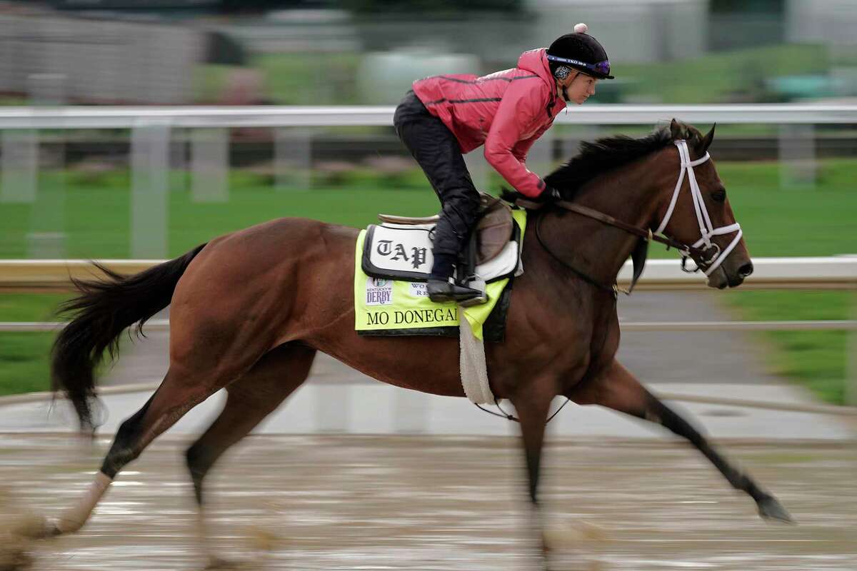 Kentucky Derby entrant Mo Donegal works out at Churchill Downs Tuesday, May 3, 2022, in Louisville, Ky. The 148th running of the Kentucky Derby is scheduled for Saturday, May 7. (AP Photo/Charlie Riedel)
