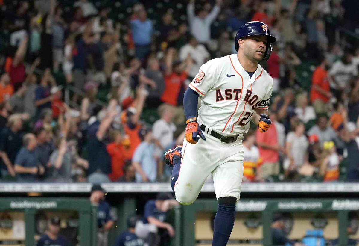 Houston Astros Jose Altuve (27) runs the bases after hitting a home run off Seattle Mariners relief pitcher Matthew Festa during the seventh inning of an MLB baseball game at Minute Maid Park on Tuesday, May 3, 2022 in Houston.
