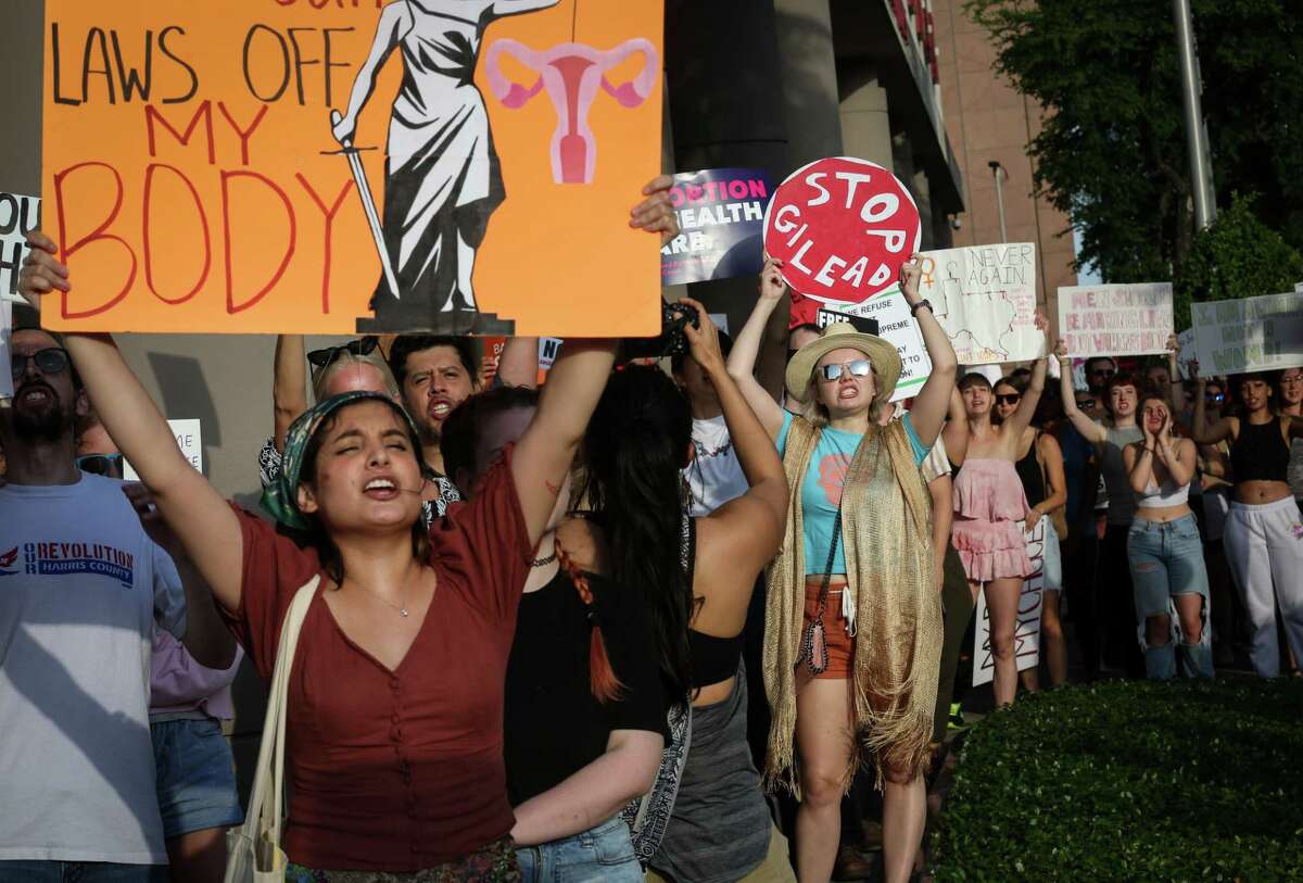 People protest for abortion rights Tuesday, May 3, 2022, at Bob Casey United States Courthouse in Houston. A leaked opinion draft showed the Supreme Court may undo legal protections for abortion set by Roe v. Wade.