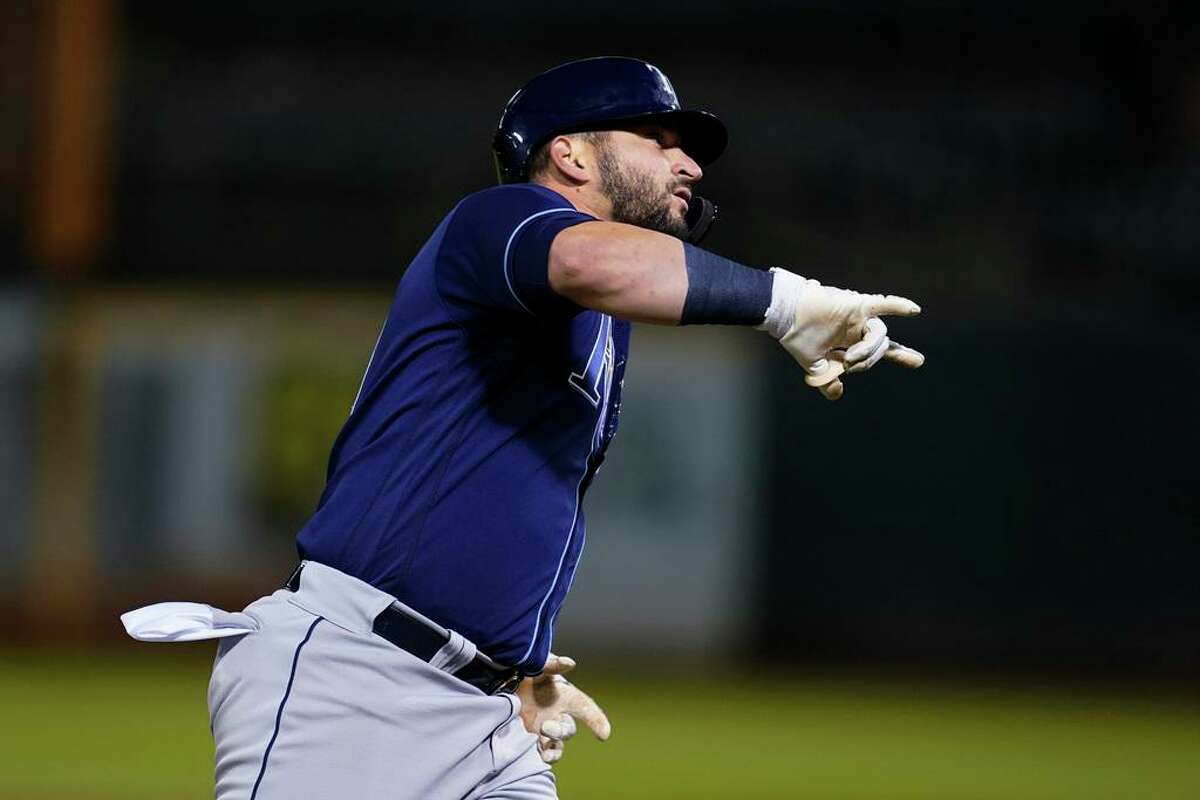 Tampa Bay Rays' Mike Zunino gestures after hitting a two-run home run against the Oakland Athletics during the ninth inning of a baseball game in Oakland, Calif., Tuesday, May 3, 2022. (AP Photo/Jeff Chiu)