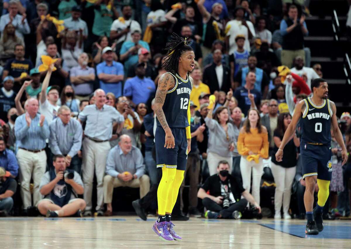 Ja Morant (12) begins to hop up and dance late in the fourth quarter as the Golden State Warriors lost to the Memphis Grizzlies 106-101 in Game 2 of the second round of the NBA Playoffs at Fedex Forum in Memphis, Tenn., on Tuesday, May 3, 2022.