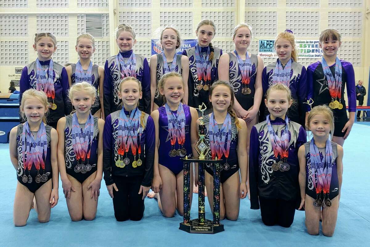Bronze members of Xcel bronze team includes a Lake County athlete: back row: River Saya, Millie Boyd, Bristol Jabrocki, Laura Johnston, Niamh Gordon, Abby Dodson, Lily Meaney, Louisa Wilson; front row: Brooklyn Melvin, Olivia Brandt, Alaina Flanery, Zoei Bessonett, Khloe Munsell of Baldwin, Harper Stepka and Finley Watson.