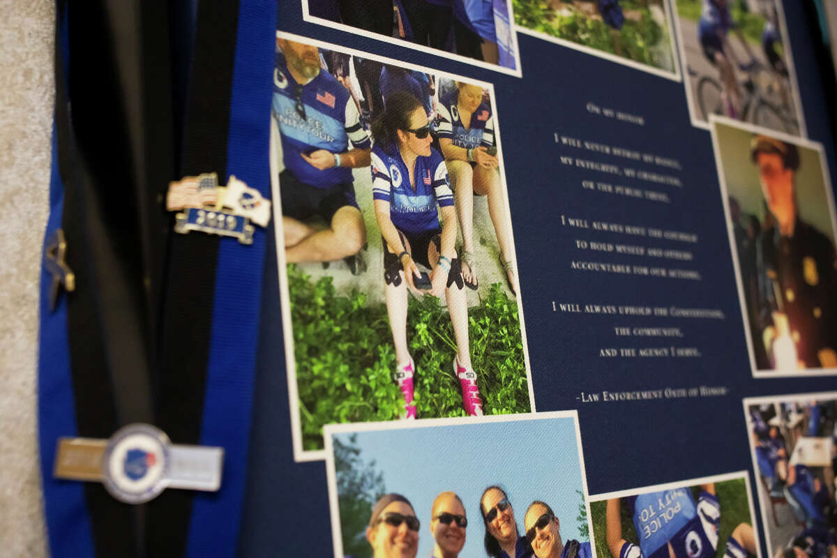 A collage of photos showing Midland Police Chief Nicole Ford's participation in the Police Unity Tour over the years is displayed in her office at the Midland Law Enforcement Center. Chief Ford will embark on the 300-mile bike ride from New Jersey to Washington, D.C. yet again on May 9, 2022.