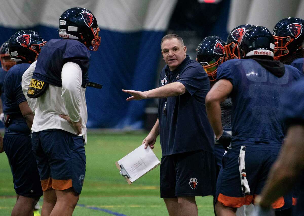 Albany Empire coach Tom Menas talks with his players during practice earlier this season. The Empire host the Columbus (Ga.) Lions on Sunday.