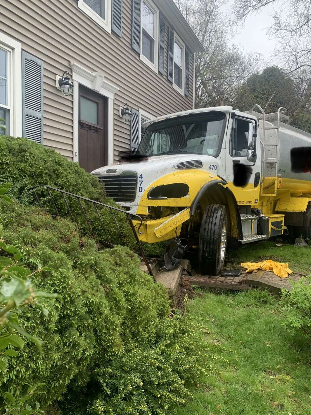 Shelton firefighters responded to a truck hitting a house on Sheehy Lane Wednesday, May 4, 2022.
