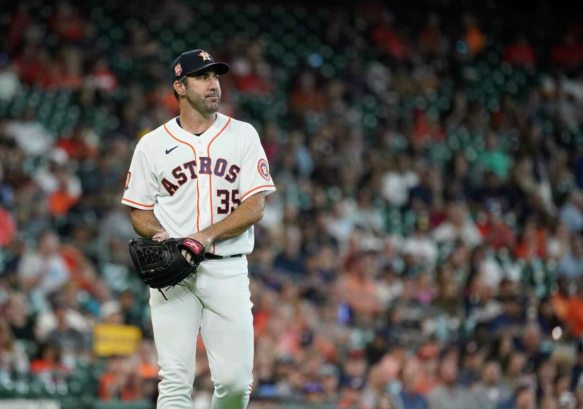 Houston Astros starting pitcher Justin Verlander (35) reacts after striking out Seattle Mariners Eugenio Suarez (28)during the third inning of an MLB baseball game at Minute Maid Park on Wednesday, May 4, 2022 in Houston.