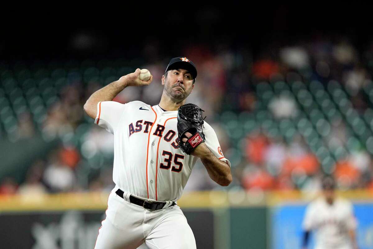 Houston Astros starting pitcher Justin Verlander throws during the first inning of a baseball game against the Seattle Mariners Wednesday, May 4, 2022, in Houston. (AP Photo/David J. Phillip)