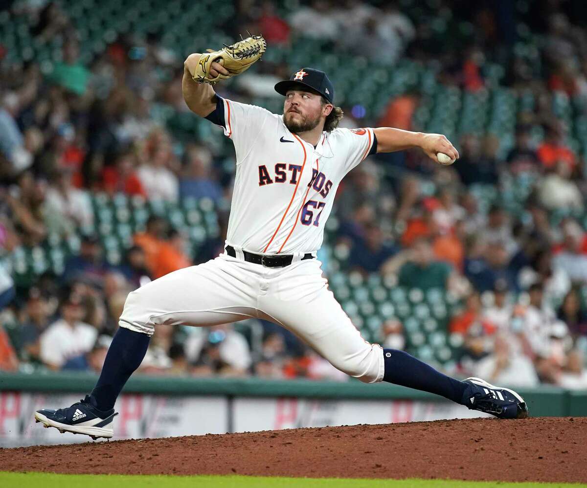 Houston Astros starting pitcher Parker Mushinski (67) pitches to \Seattle Mariners Jarred Kelenic (10) during the eighth inning of an MLB baseball game at Minute Maid Park on Wednesday, May 4, 2022 in Houston.