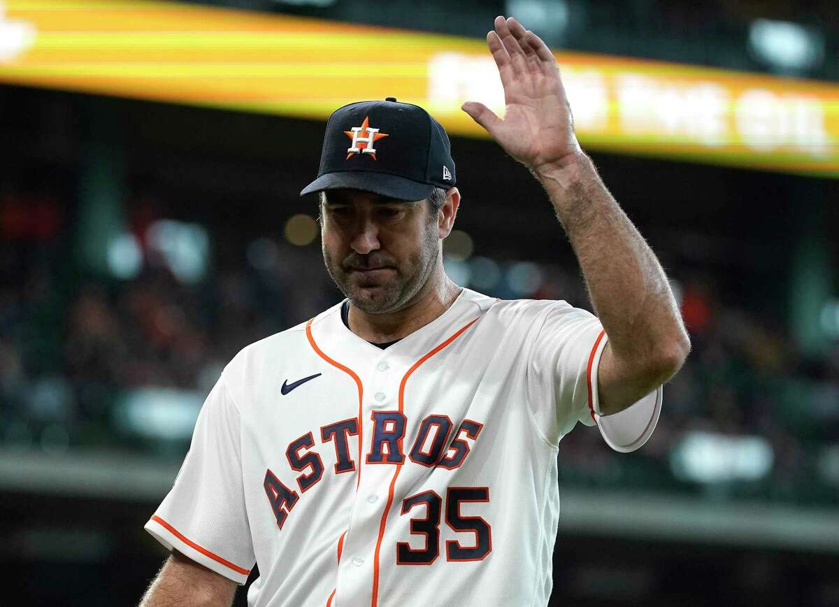 After throwing a season-high 101 pitches, Astros pitcher Justin Verlander acknowledges the crowd as he departs Wednesday’s game with two outs in the seventh.