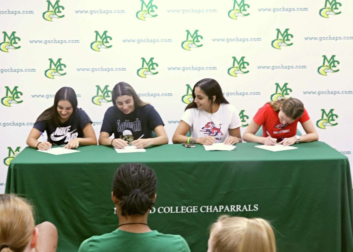 Midland College volleyball players, from left to right, Romina Vacca (University of Maryland-Eastern Shore), Macarena Flores (University of Illinois-Springfield), Tori Lasley (Savannah State University), Lucie Maceckova (MidAmerica Nazarene University) sign their letters-of-intent on Wednesday at MC. 