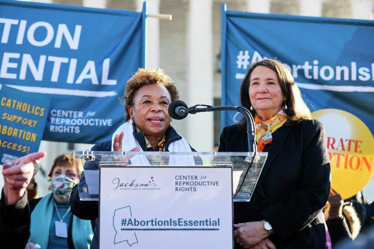 California Rep. Barbara Lee (left) and Colorado Rep. Diana DeGette, both Democrats, at a demonstration in front of the U.S. Supreme Court as justices hear arguments in Dobbs v. Jackson Women’s Health, a Mississippi law that bans most abortions after 15 weeks, in December. Lee chose to share her personal abortion story after the passage of an even stricter Texas law in September 2021, partly as a warning of the dangers she said would return if Roe v. Wade is overturned.