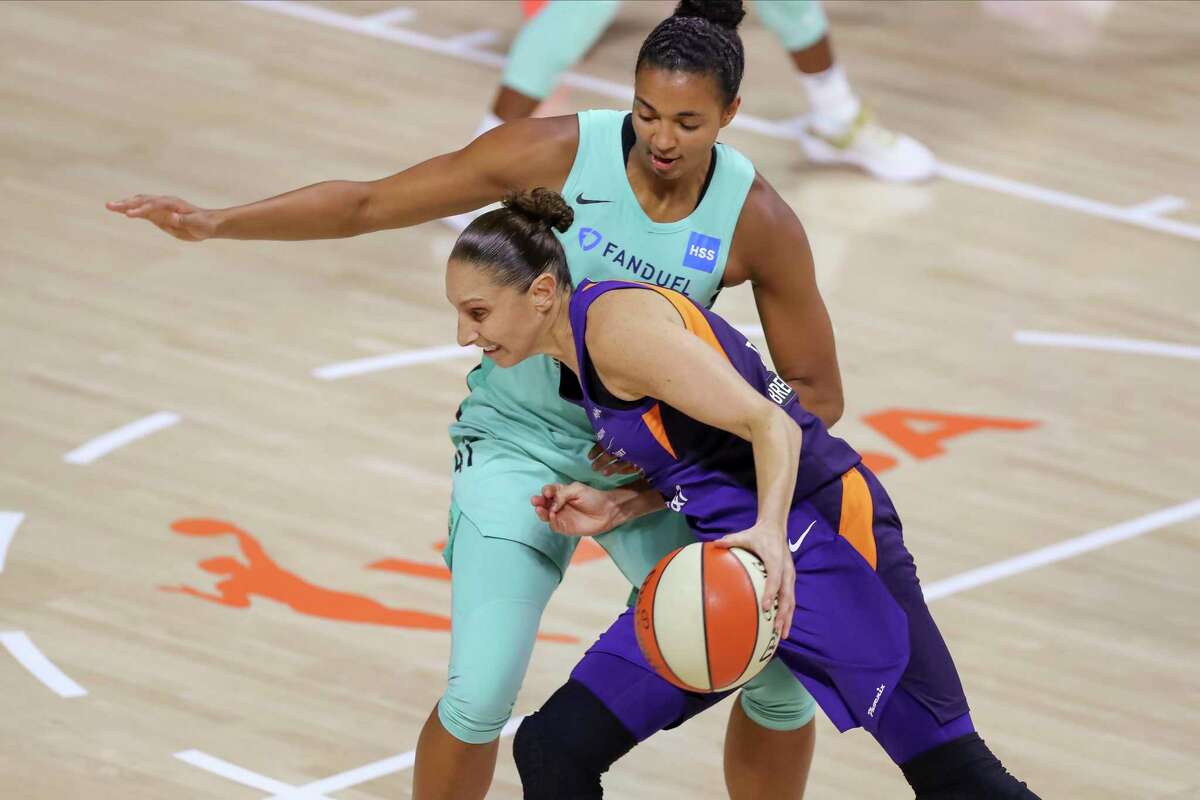 Phoenix Mercury's Diana Taurasi drives against New York Liberty's Kiah Stokes during the first half of a WNBA basketball game Saturday, Sept. 5, 2020, in Bradenton, Fla. (AP Photo/Mike Carlson)