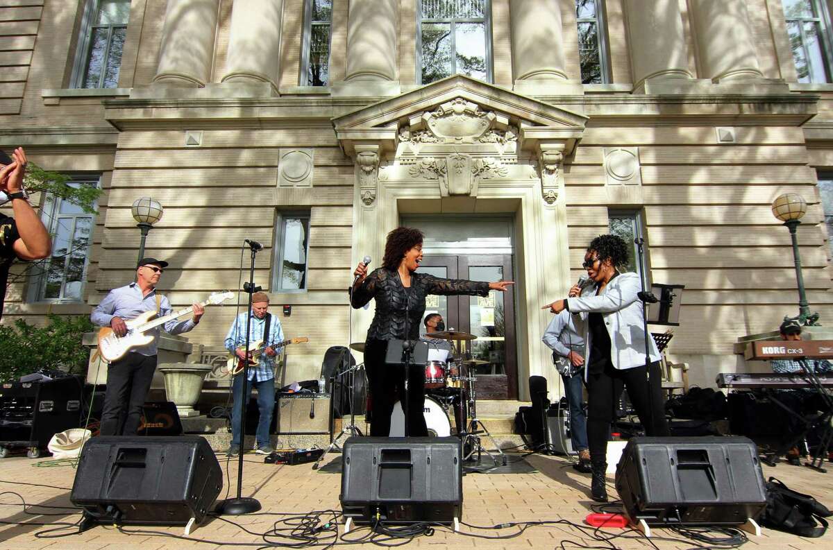 The band 9 of Hearts performs during the opening day of Art to the Avenue in downtown Greenwich on May 6, 2021. Art to the Avenue returns Thursday night with a kickoff event, and the art will be on display through May 31.