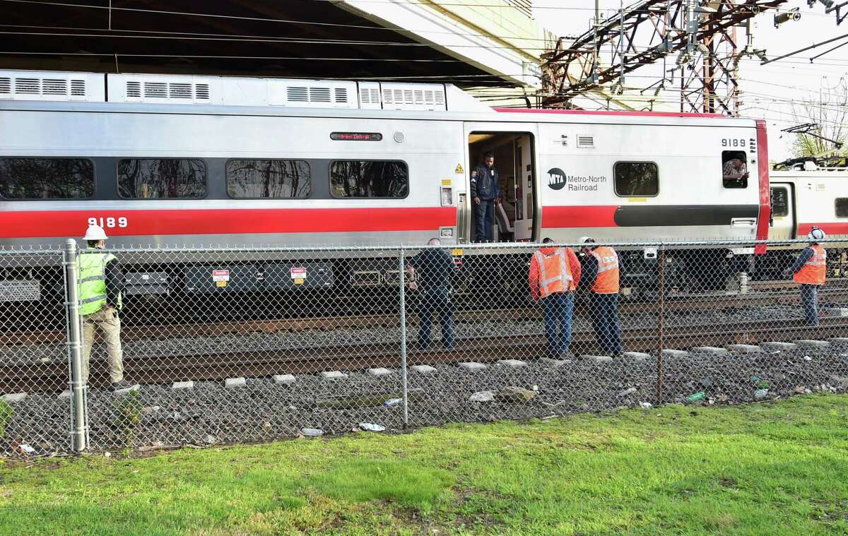 Metro-North police investigate a person struck on the southbound track at the Cos Cob station in Greenwich, Conn., on Wednesday May 4, 2022.