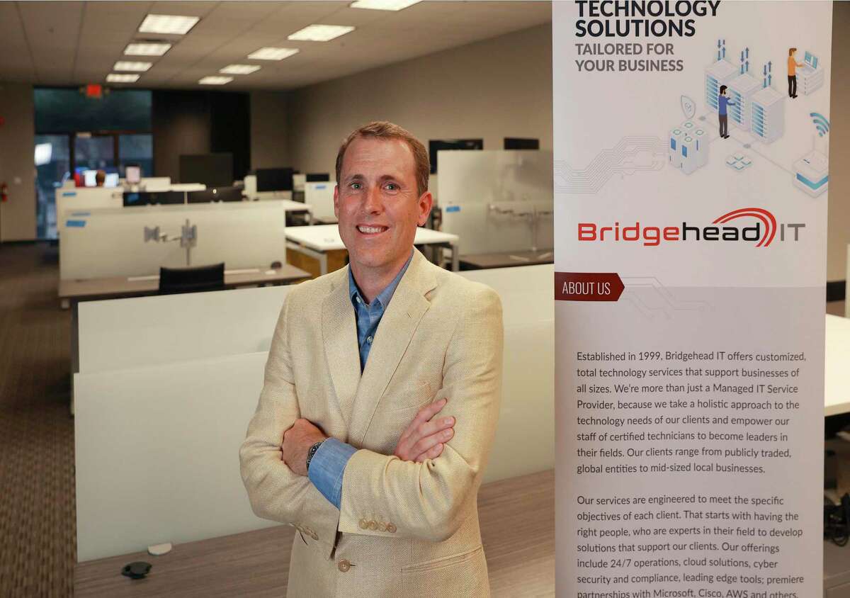 Bridgehead IT CEO Wes Bunch and his company recently moved into a new building. The company is a rapidly growing IT tech firm. They moved into a new office building amid a revenue increase due to a statewide business boom and remote services.