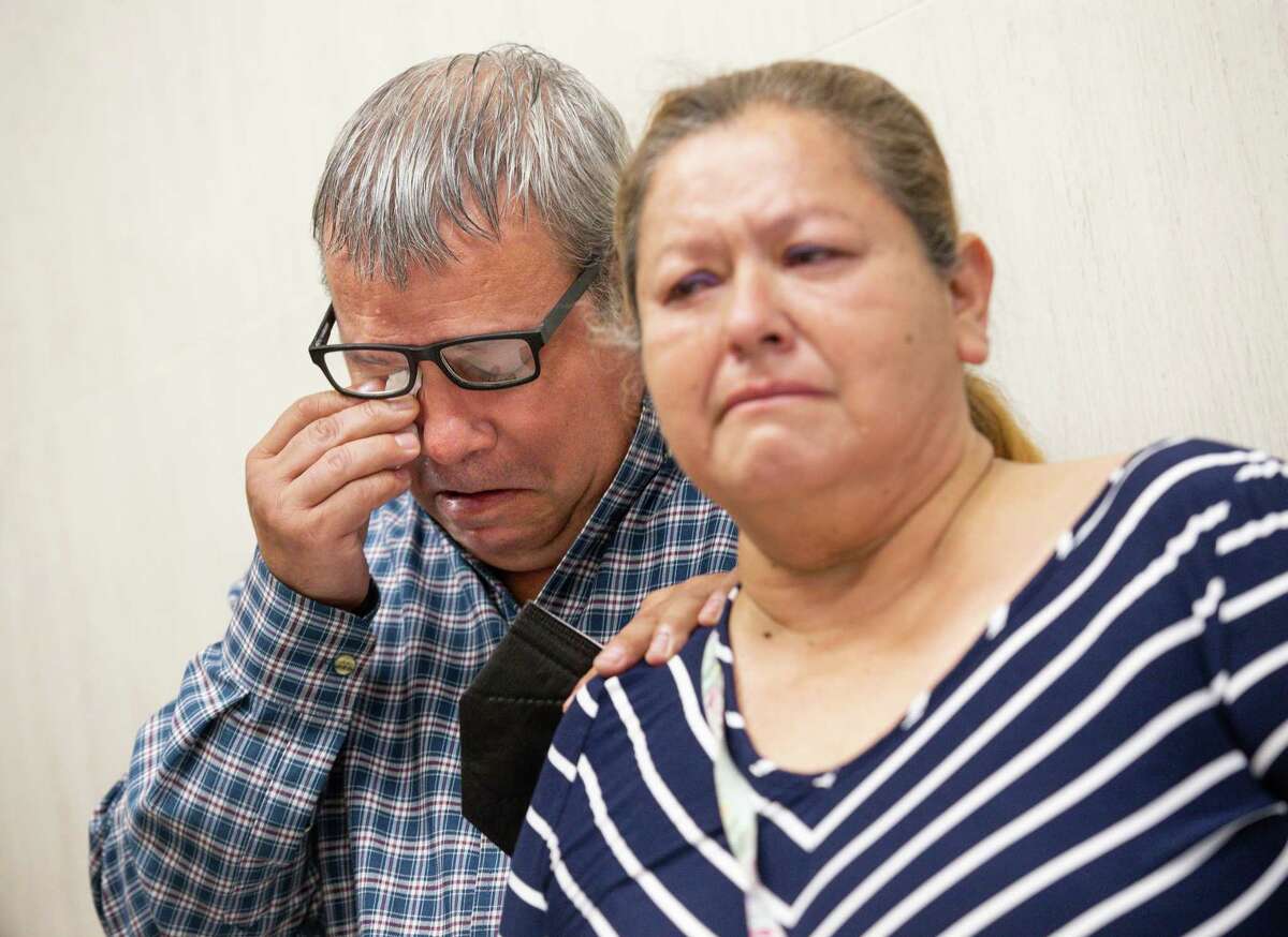Juan, left, and Maria Flores cry as their son’s best friend talked about the type of friend Josue Flores was during a press conference following the sentencing for Andre Jackson – who was sentenced to life in prison for the fatal stabbing of Josue – at the Harris County Criminal Courthouse on Wednesday, May 4, 2022, in Houston. Josue was 11 years old when he was killed on May 17, 2016.