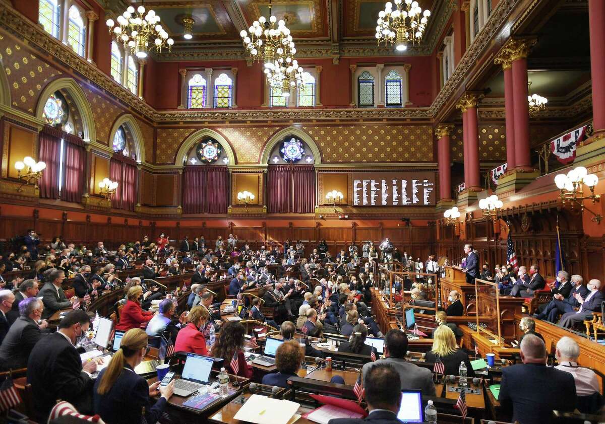 Governor Ned Lamont addresses a full house, the combined House and Senate, during the opening day of the 2022 legislative session at the Capitol in Hartford, Conn. on Wednesday, February 9, 2022.