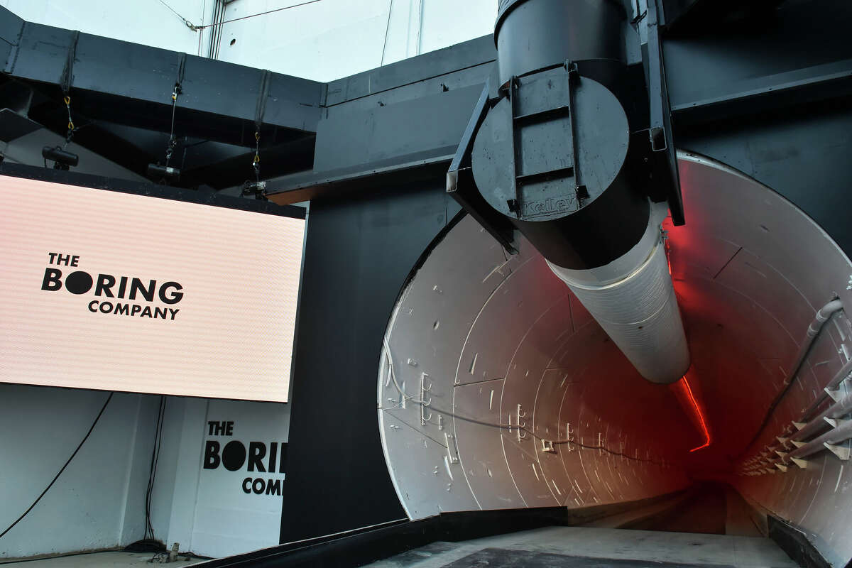 HAWTHORNE, CA - DECEMBER 18: The Boring Company signage is displayed at the tunnel entrance before an unveiling event for The Boring Company Hawthorne test tunnel December 18, 2018 in Hawthorne, California. On Tuesday night, The Boring Company will officially open the Hawthorne tunnel, a preview of Elon Musk's larger vision to ease traffic in Los Angeles. (Photo by Robyn Beck-Pool/Getty Images)