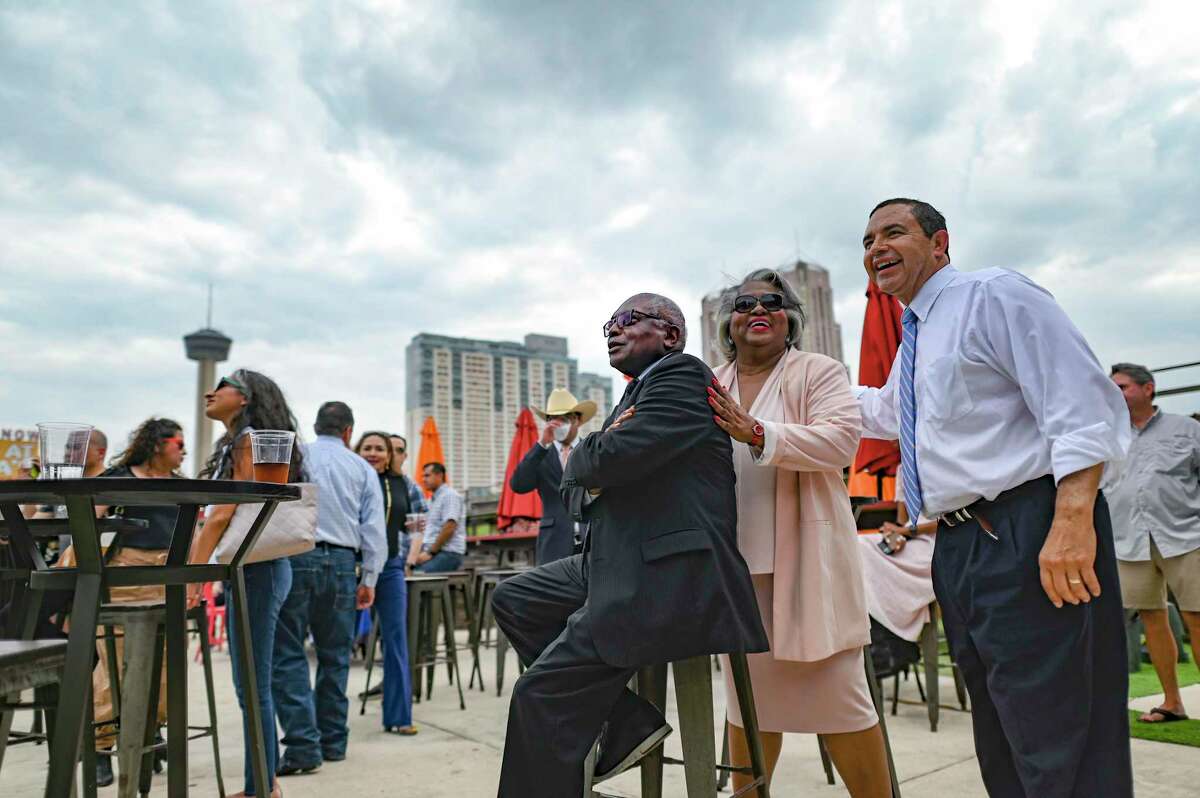 U.S. Rep. Henry Cuellar, D-Laredo, right, Texas Rep. Barbara Gervin Hawkins and U.S. House Majority Whip James E. Clyburn gather for a rally in support of Cuellar during a rally on Wednesday, May 4, 2022, at the Smoke BBQ+SKYBAR in San Antonio. Cuellar is defending his longtime South Texas congressional seat against progressive challenger Jessica Cisneros. Cuellar is facing renewed scrutiny from fellow Democrats over his anti-abortion stance following news that the U.S. Supreme Court appears poised to overturn Roe v. Wade.