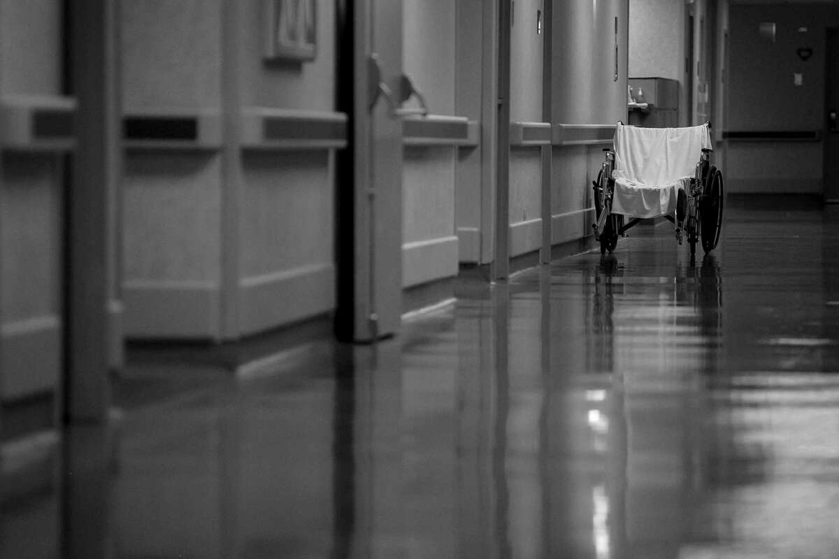 An empty wheelchair is seen in the hallway at Texas Vista Medical Center, one of only two trauma hospitals on the South Side.