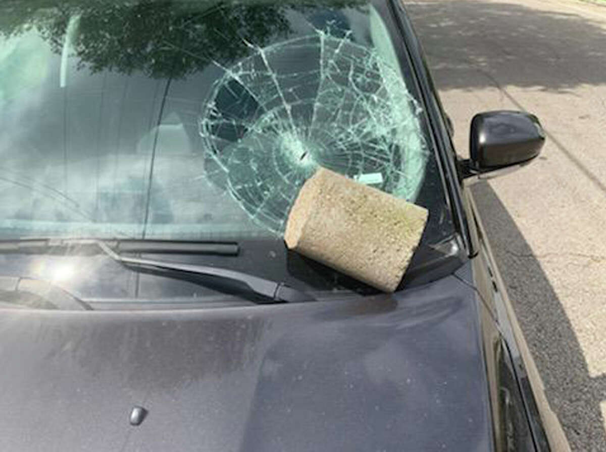 Museum District resident Jennyfer Herrington discovered a mystery cement block had crushed her daughter's rental vehicle on Thursday.