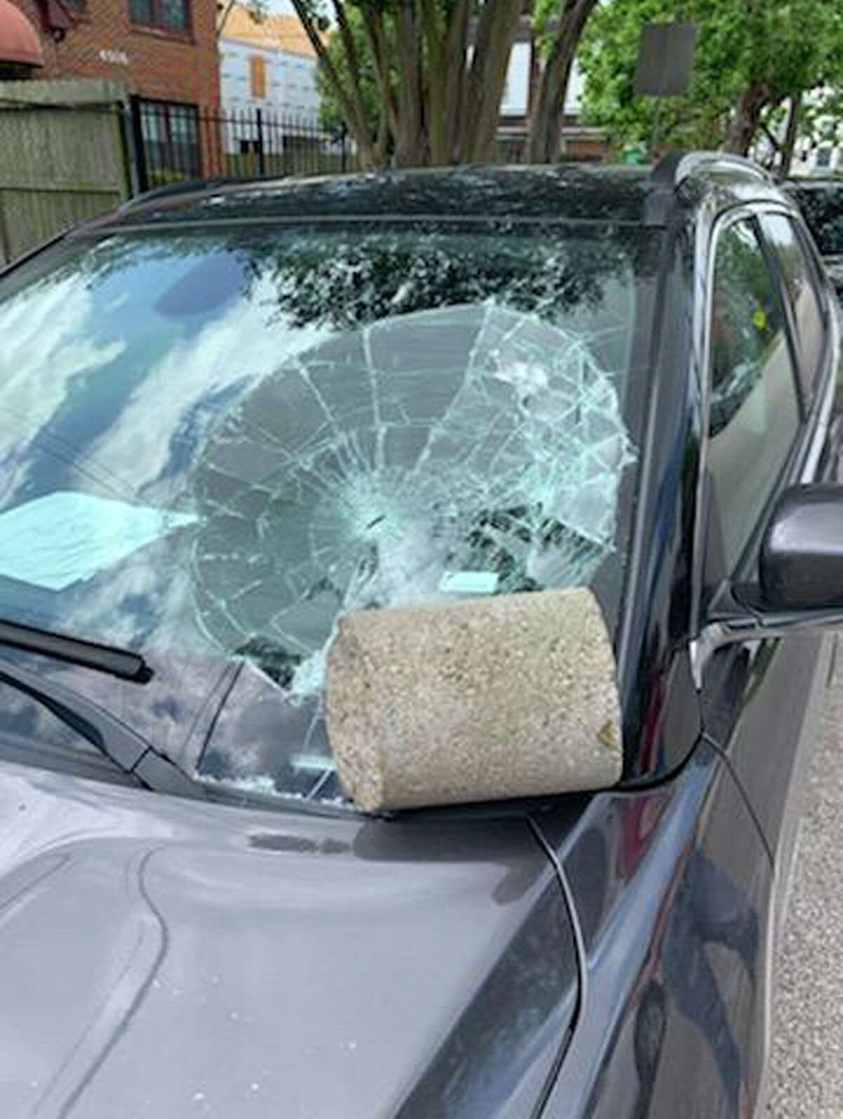 Museum District resident Jennyfer Herrington discovered a mystery cement block had crushed her daughter's rental vehicle on Thursday.