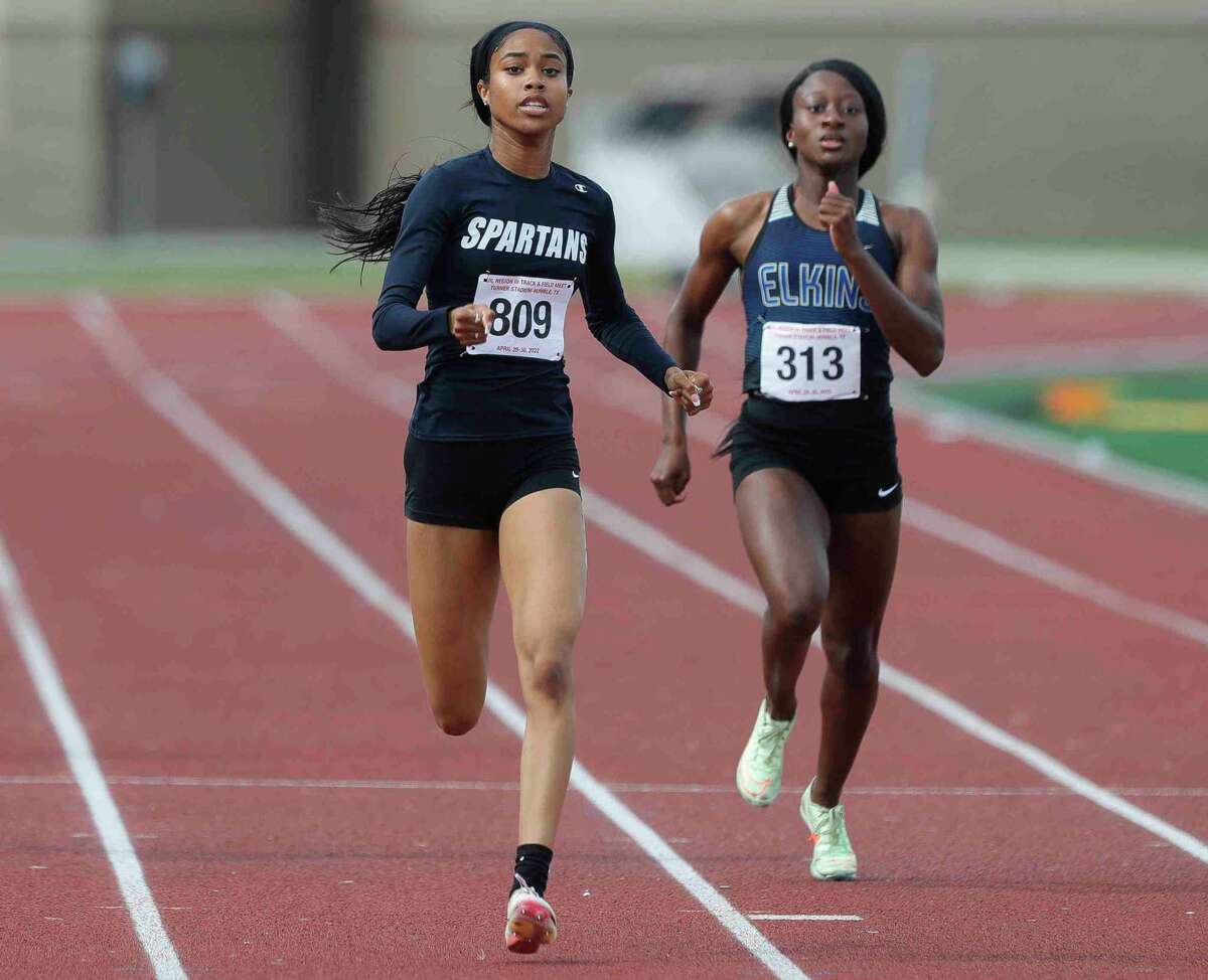 Haley Tate of Seven Lakes competes in the Class 6A girls 400-meter dash during the Region III track and field championships at Turner Stadium, Saturday, April 30, 2022, in Humble.