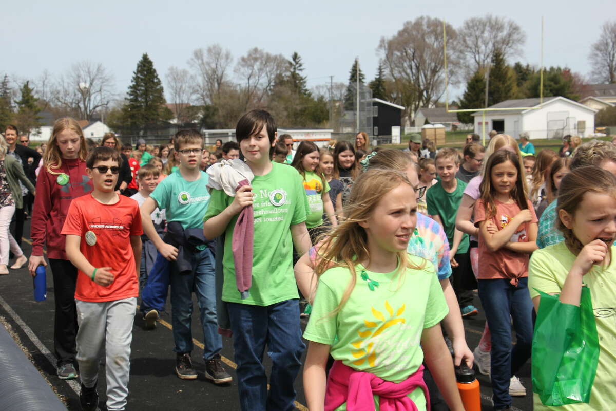 The students wear green, the official color of Mental Health Awareness Month.