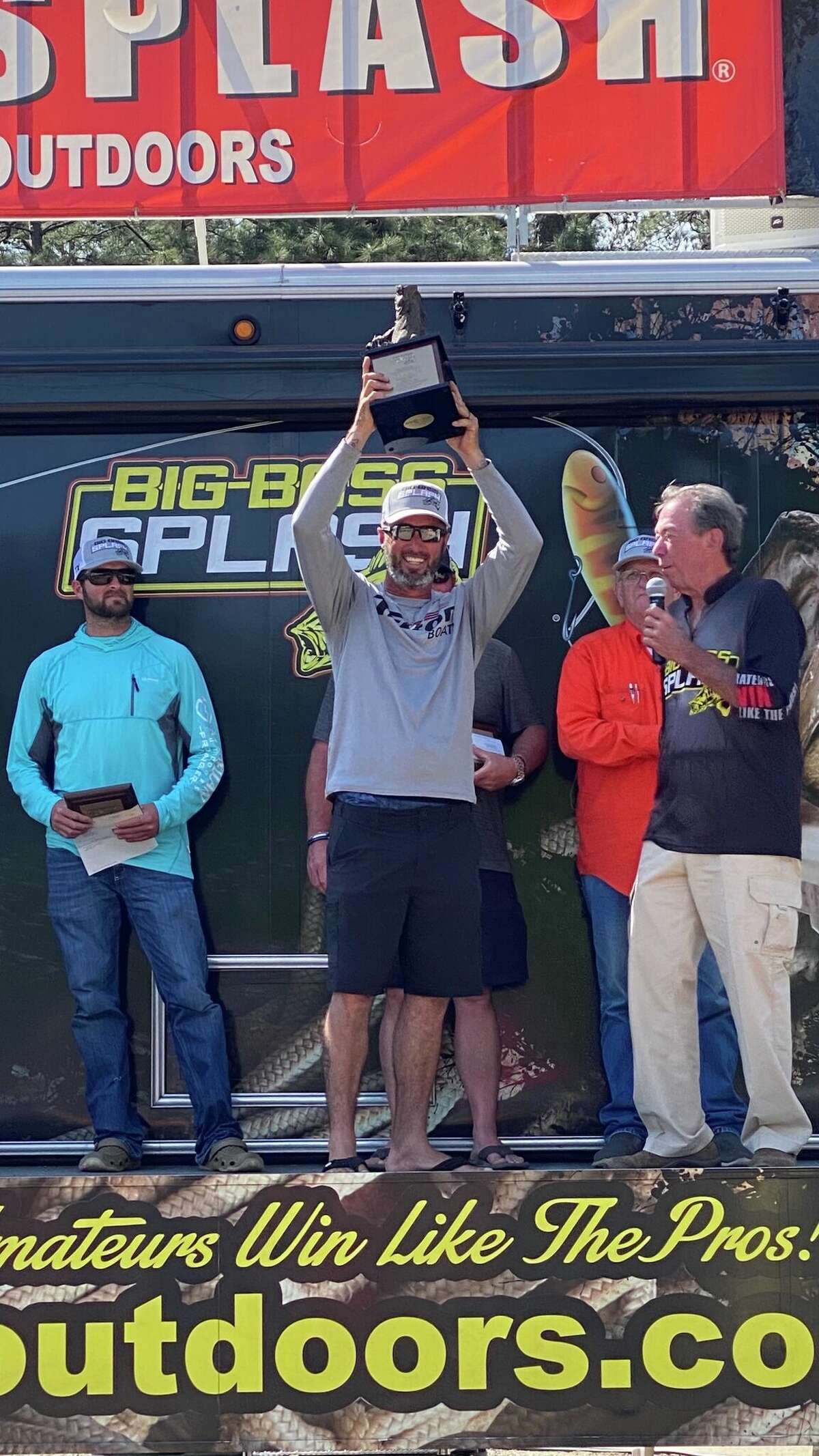 Ralph Dupuy of Groves hoists the winner’s trophy after taking the top spot in the 2022 Big Bass Splash on Sam Rayburn. Dupuy is the first two-time winner amateur fishing’s oldest big bass event. 