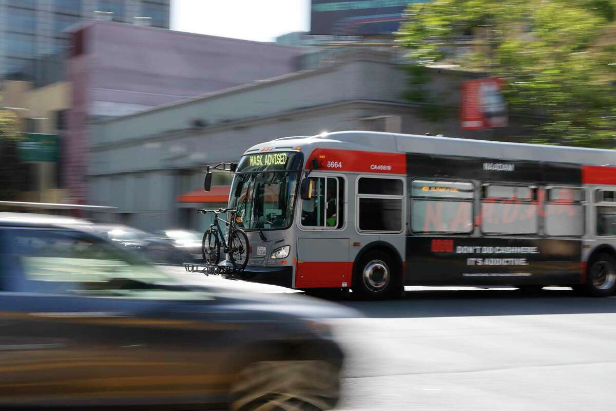A bus drives in a dedicated lane on Muni’s new Van Ness BRT line on April 28.