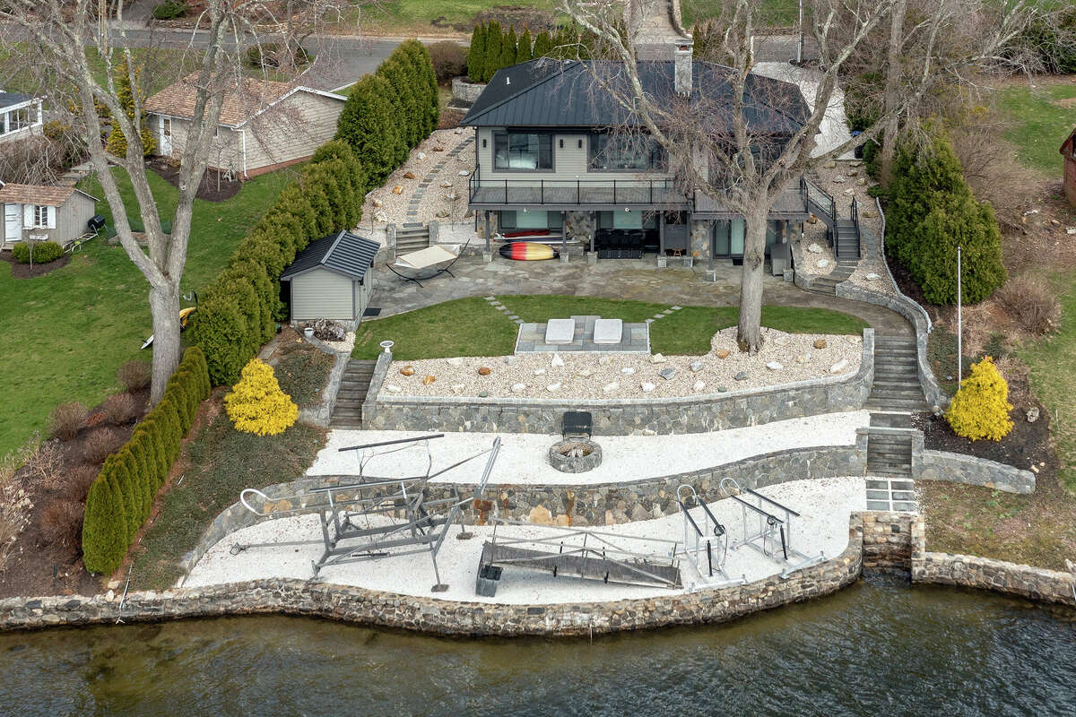 The home on 68 South Lake Shore Drive in Brookfield, Conn. has more than 100 feet of frontage on Candlewood Lake.