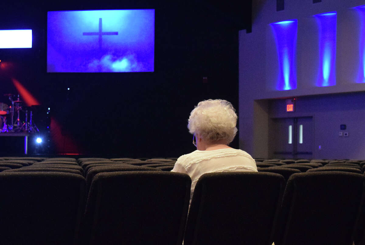 Jan Glossop of South Jacksonville takes part in quiet prayer at First Christian Church. The church held two self-guided prayer sessions Thursday in recognition of National Day of Prayer. The day, first observed in 1952, is an annual event that urges people "to turn to God in prayer and meditation."