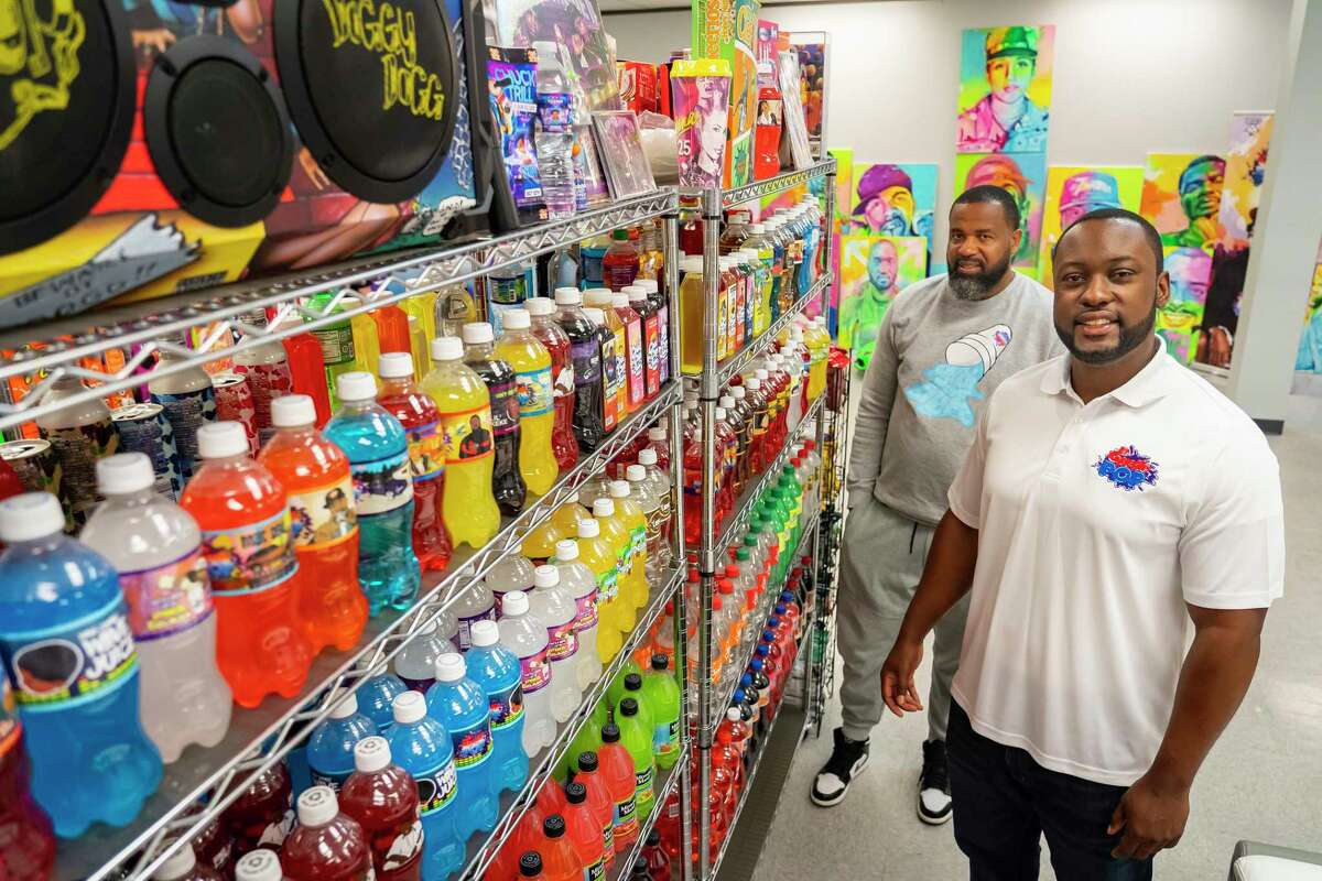 Exotic Pop founder and CEO Charleston Wilson, right, and president Kehlin Farooq sell hard-to-find sodas and snacks at Exotic Pop in Houston.