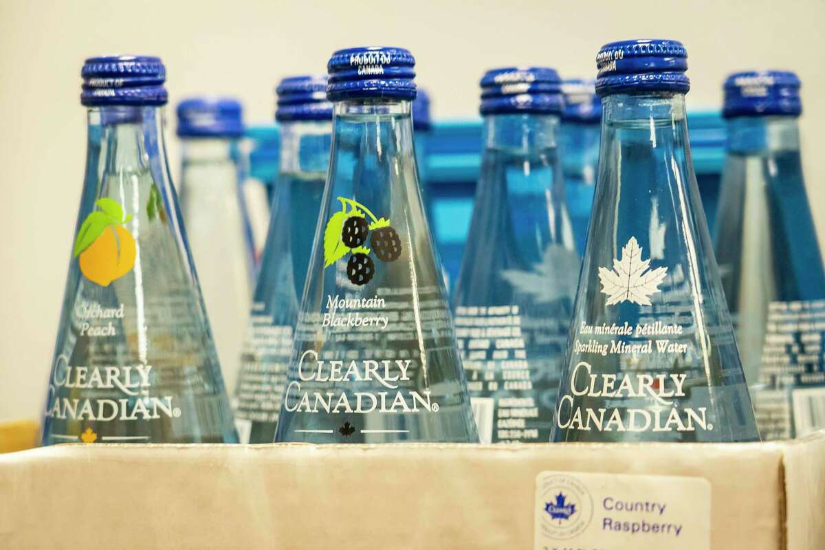 Cases of Clearly Canadian, a drink that Exotic Pop supplies to Drake when he is in Houston, sits on a shelf inside their warehouse.