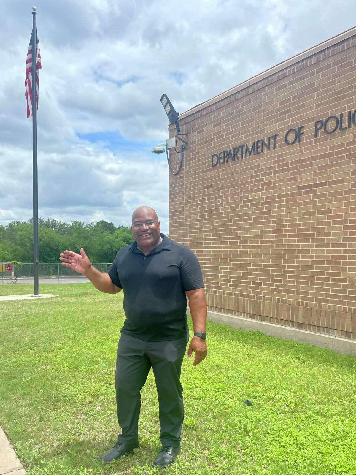 Sean Preyor-Johnson waves goodbye after his final roll call, more than 29 years after he entered the San Antonio Police Academy. He recently retired as an SAPD Detective/Investigator.